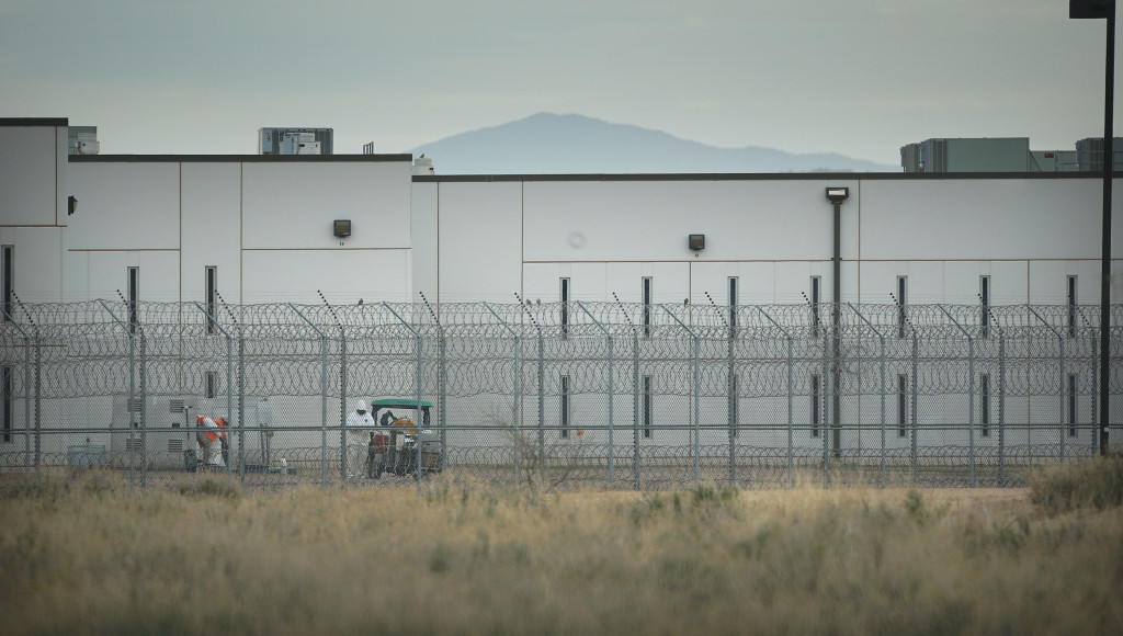 Saguaro Correctional Facility. People walking around inside of fences. Eloy, Arizona 6 march 2016. photograph Cory Lum/Civil Beat