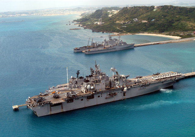 030228-N-3612M-009White Beach Port Facility, Okinawa, Japan (Feb. 28, 2003) - A busy day for the White Beach Port Facility in Okinawa, Japan as the amphibious assault ship USS Essex (LHD 2), Japanese Maritime Defense Force (JMSDF) ships Shimakaze (DDG 172), Myoukou (DDG 175), Hamagiri (DD 155), Natusio (SS 584), USS Juneau (LPD 10), and USS Fort McHenry (LSD 43) sit moored pierside. U.S. Navy photo by PhotographerÕs Mate 1st Class James G. McCarter. (RELEASED)