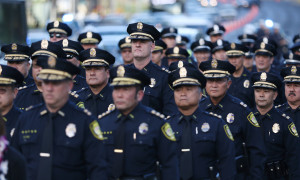 HPD officers walk down South Beretania Street in a processional, part of a program honoring 'those officers who have died in the line of duty' at the Hawaii State Capitol Rotunda, part of 2016 Police Week. 16 may 2016.