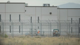 Saguaro Correctional Facility. People walking around inside of fences. Eloy, Arizona 6 march 2016. photograph Cory Lum/Civil Beat