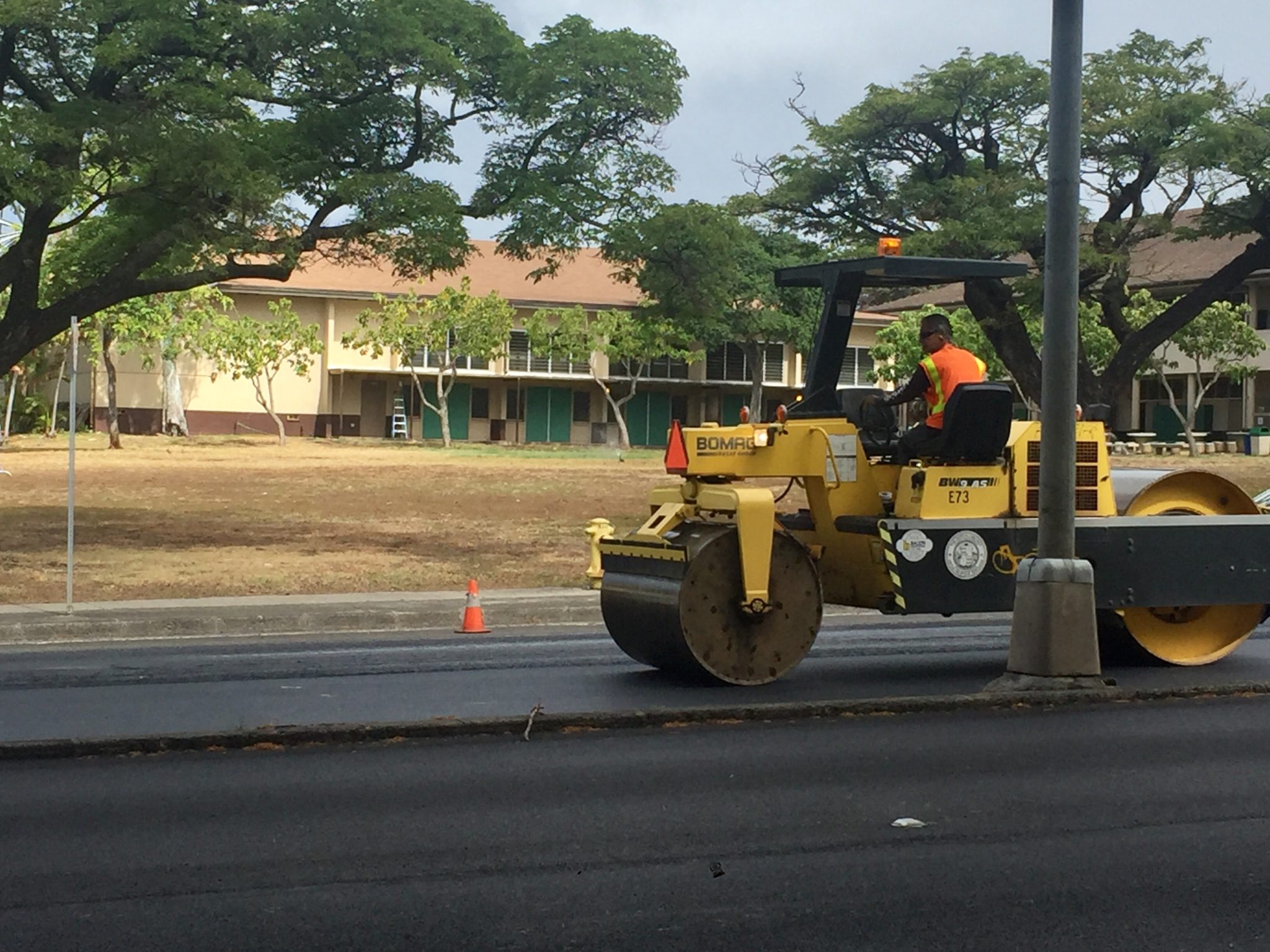 road repave repaving asphalt fixing potholes university avenue