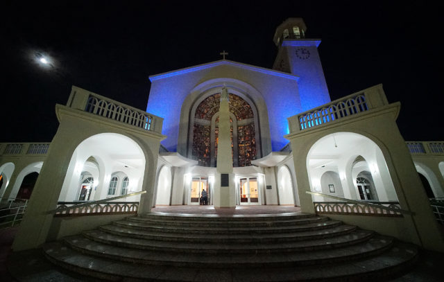 Moon sets over the Guam Hagatna Cathedral before 545am mass.