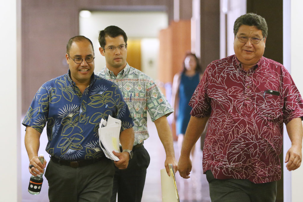 Senate President Kouchi and Senator Dela Cruz head over to Speaker Saiki's office for meeting before press conference.