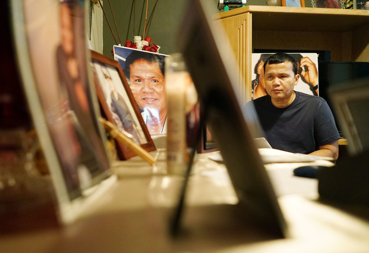 Roy Quintanilla during rosary held for his younger brother who died last year and another elder brother who passed away.