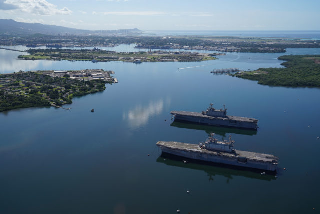 Pearl Harbor Arizona Memorial Ford Island West Loch derelict ships.