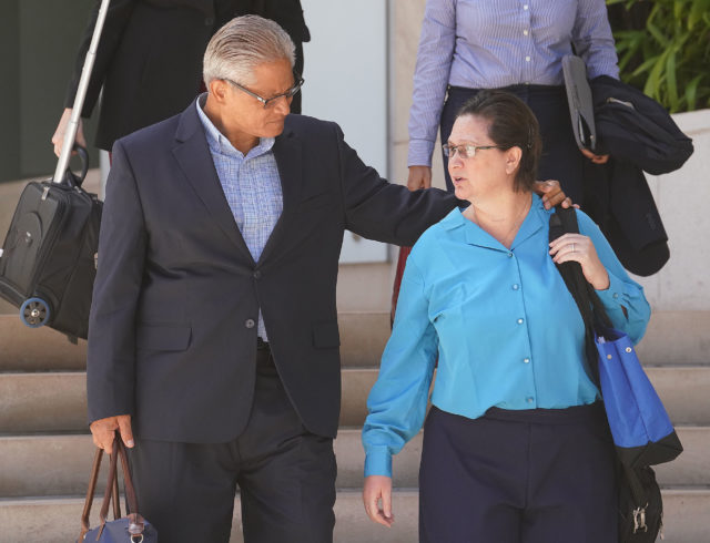 Former HPD Chief Louis Kealoha and Katherine Kealoha leave District Court on lunch break.