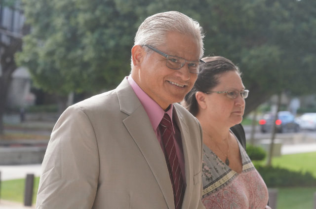 Former HPD Chief Louis Kealoha and Katherine Kealoha arrive at District Court.