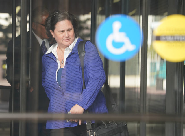 Katherine Kealoha arrives with former HPD chief Louis Kealoha to District Court.
