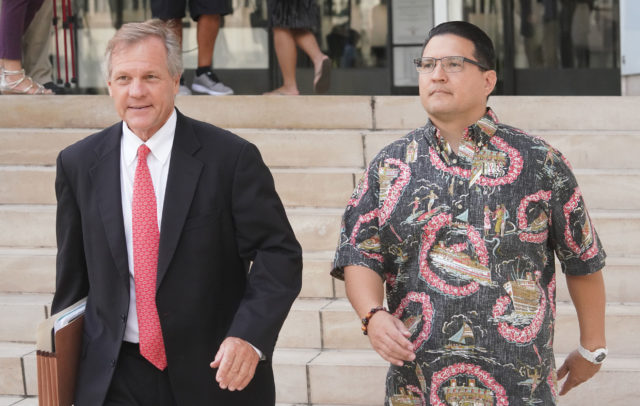 Derek Hahn leaves District Court with Attorney Birney Bervar after jury read verdict