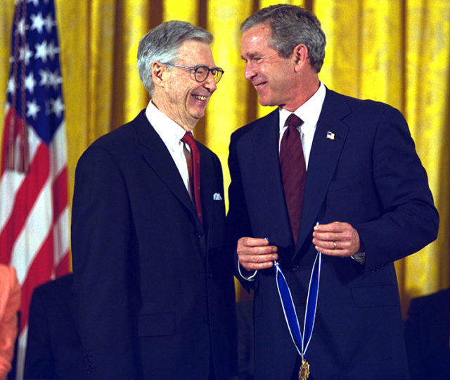President George W. Bush presents the Presidential Medal of Freedom Award to Fred Rogers July 9, 2002, during ceremonies in the East Room. Photo by Paul Morse, Courtesy of the George W. Bush Presidential Library