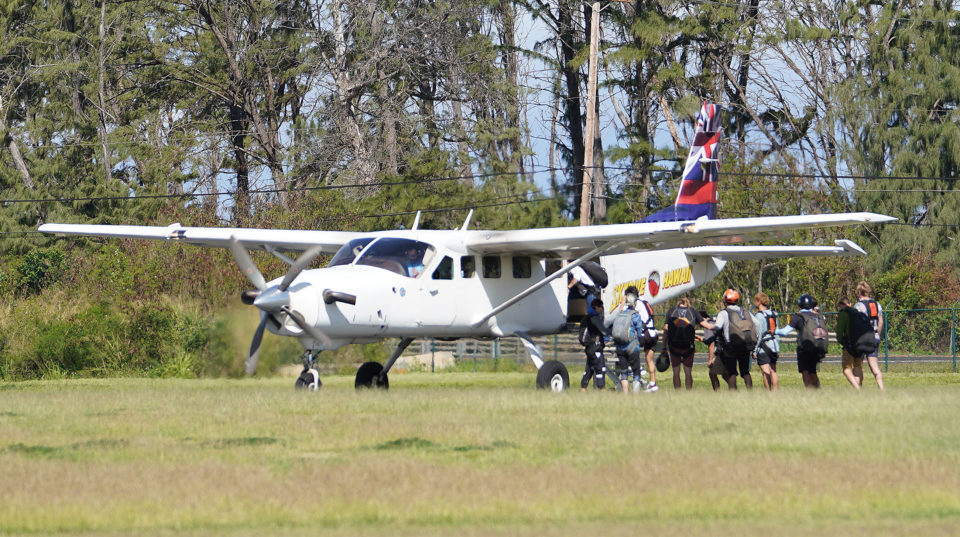 Skydivers load up the aircraft for their next jump at Dillingham Airfield.