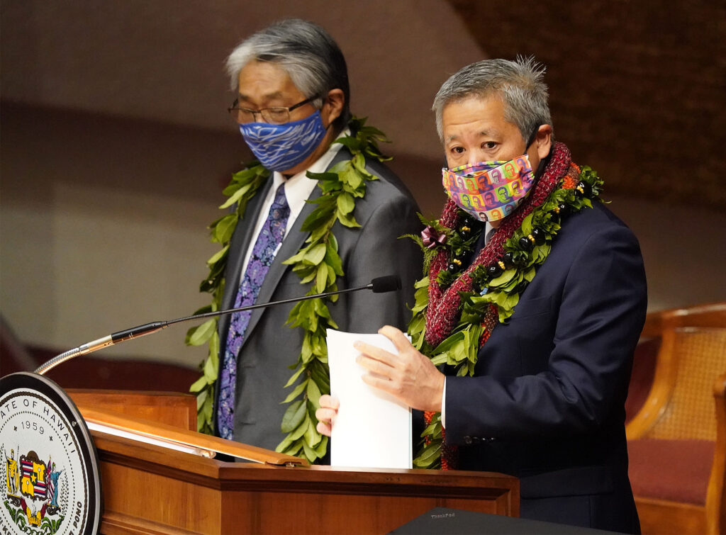 Masked House Speaker Scott Saiki and Vice Speaker Mark Nakashima on opening day of the 2021 legislature at the Capitol.