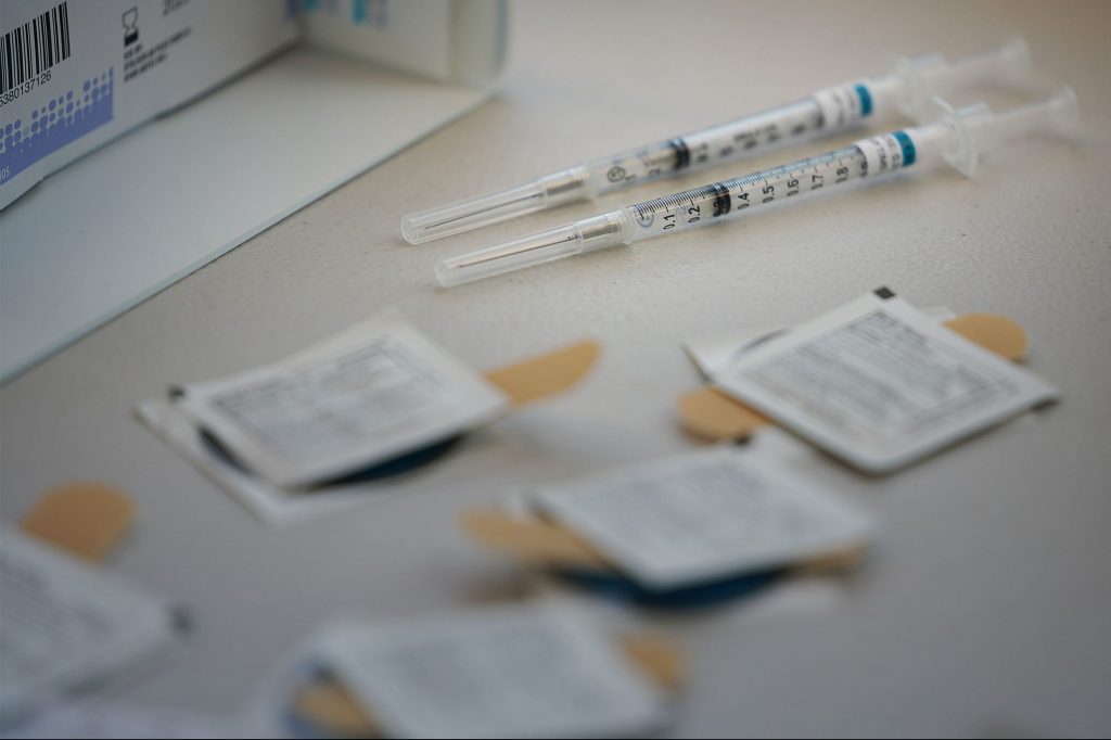 Closeup of COVID-19 Pfizer vaccine in syringes inside the Hawaii Pacific Health bus located at Ilima Intermediate School vaccinations. July 27, 2021