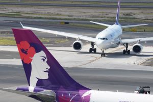 A Hawaiian Airlines aircraft taxis to the gate at Daniel K. Inouye International Airport.