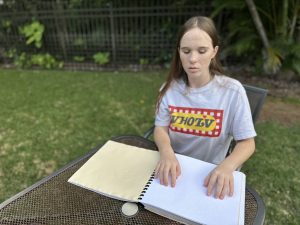 Emerie Mitchell-Butler, 16, depends on reading tactile graphs in order for her to understand charts and diagrams. She said she didn't get her textbook until January. (Courtesy: Tabatha Mitchell/2022)