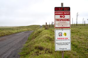 A sign recognizes the wildfire risk in the area along Mana Road near Waimea on the Big Island. (Nathan Eagle/Civil Beat/2023)