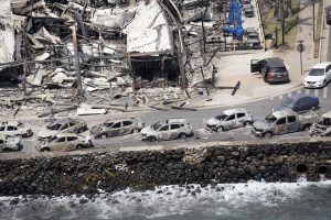 Destroyed buildings and vehicles on Lahania’s Front Street  are photographed Thursday, Aug. 10, 2023, in Maui. (Kevin Fujii/Civil Beat/2023)
