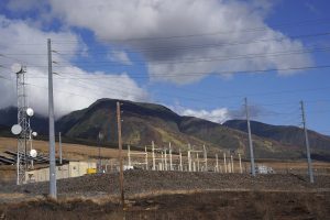 The HECO power station mauka of the Lahaina Bypass sits directly above the charred remains of a large wildfire Sunday, Aug. 13, 2023, in Lahaina. A large fire consumed areas of West Maui last week. Utilities have not been fully restored.  (Kevin Fujii/Civil Beat/2023)