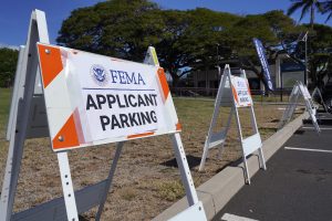 FEMA and Hawaii Department of Labor Workforce Development help those affected by wildfires on Maui Thursday, Aug. 17, 2023, at the University of Hawaii Maui College in Kahului. A wildfire destroyed the historic town of Lahaina last week. (Kevin Fujii/Civil Beat/2023)