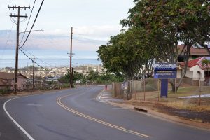 Lahainaluna Road is the only way in or out of the neighborhood mauka of Lahaina town photographed Tuesday, Oct. 10, 2023, in Lahaina. The road services the neighborhood residents plus faculty, staff and students at Lahainaluna High School, Lahaina Intermediate School and Princess Nahienaena Elementary School. Parents have expressed concerns about access and egress in case of another emergency like the Aug. 8 fire.  (Kevin Fujii/Civil Beat/2023)