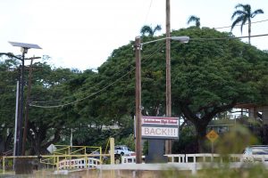 The Lahainaluna High School sign welcomes back students Monday, Oct. 16, 2023, in Lahaina. The school has been closed since the Aug. 8 fire and studying at other schools in Maui. (Kevin Fujii/Civil Beat/2023)