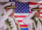 220616-N-KN989-1004 JOINT BASE PEARL HARBOR-HICKAM, Hawaii (June 16, 2022) Capt. James Meyer, commanding officer, Navy Facilities (NAVFAC) Engineering Systems Command Hawaii (left), and Capt. Cameron Geertsema salute the ensign during a change of command ceremony. Meyer was relieved by Geertsema during the official NAVFAC Hawaii change of command ceremony June 16, 2022. (U.S. Navy photo by Melvin J. Gonzalvo)