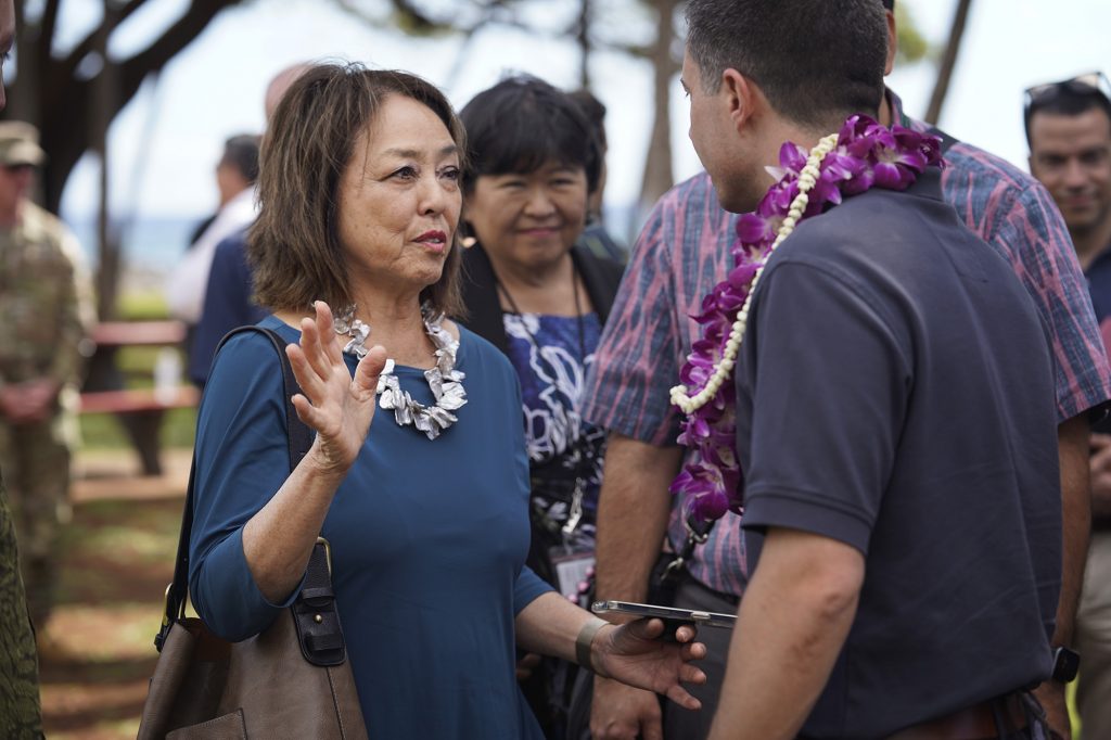Maui County Council member vice-chair Yuki Lei Sugimura talks with Transportation Secretary Pete Buttigieg on Wednesday, Feb. 21, 2024, in Lahaina. (Kevin Fujii/Civil Beat/2024)