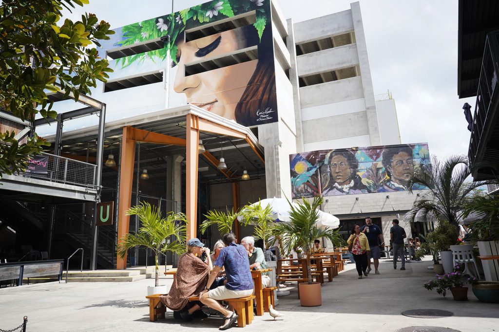People have lunch in the pedestrian zone of Salt At Our Kakaako Friday, March 8, 2024, in Honolulu. There is a proposal to turn over West Maui’s re-development to the Hawaii Community Development Authority which revitalized Kakaako. (Kevin Fujii/Civil Beat/2024)