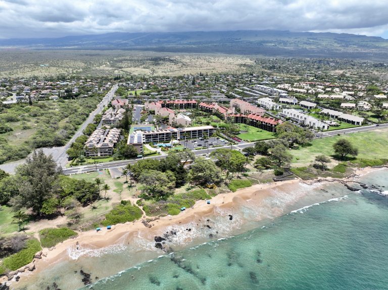 Aerial view of the Kamaole Sands apartments in South Maui. The units are primarily used for short-term rentals which the county is proposing transitioning to long-term rentals.