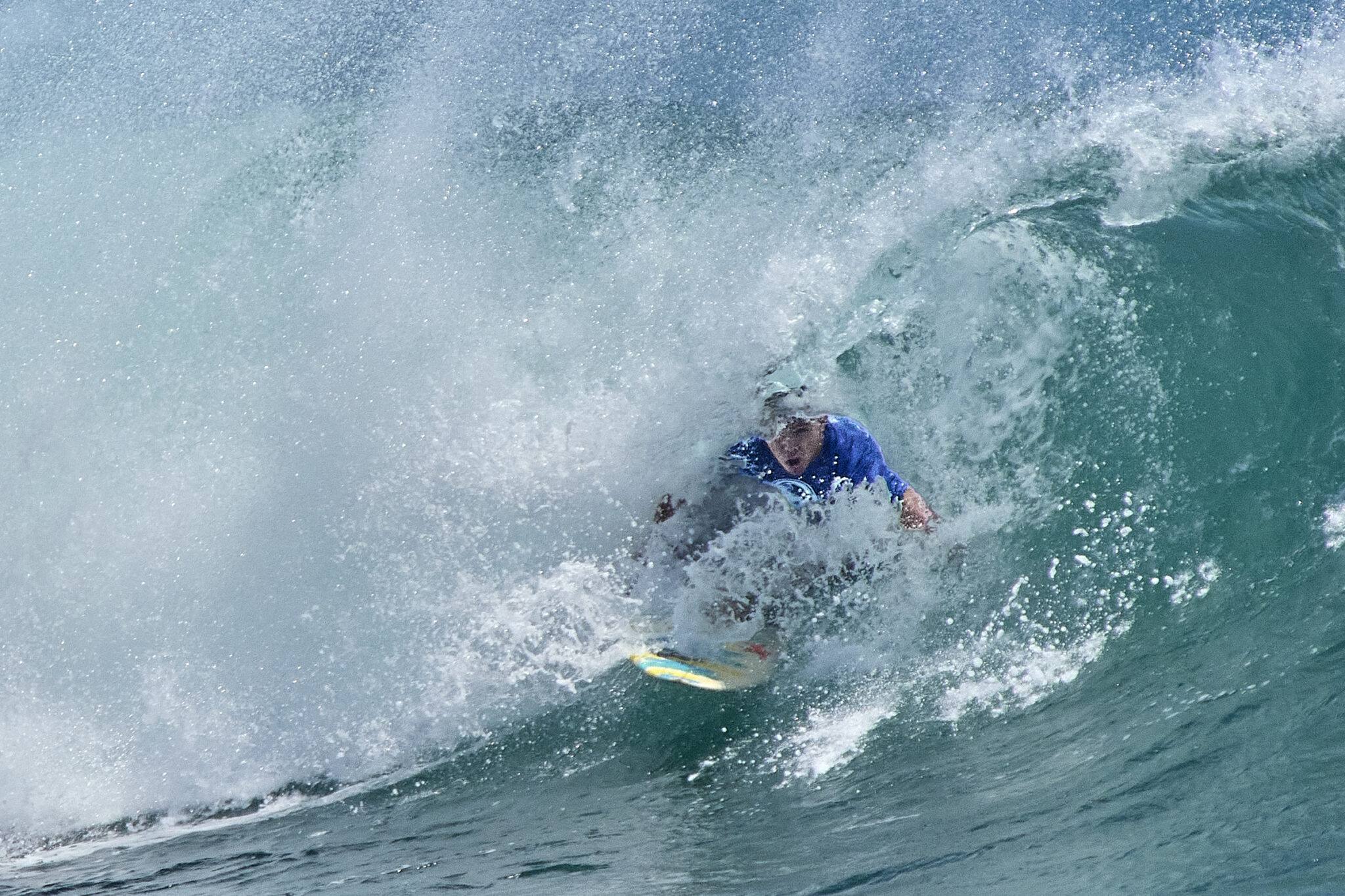 On Tuesday and Wednesday Nike Swim hosted the inaugural Honua Finals: The World Cup of Interscholastic Surfing that brought High School surfers from Hawaii, the Mainland and New Zealand together at Ala Moana Bowls to compete in the first Scholastic International surfing competition. (David Croxford/Civil Beat/2024)