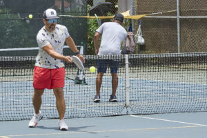For the last decade PickleBall has been gaining in popularity all over the United States. While not as refined as the game of Tennis, the sport does provide its own sense of accomplishment and thrills. This set of images were recorded at the Diamond Head Tennis Center on Paki Avenue close to Waikiki. Photographed July 15th, 2024 (David Croxford/Civil Beat/2024)