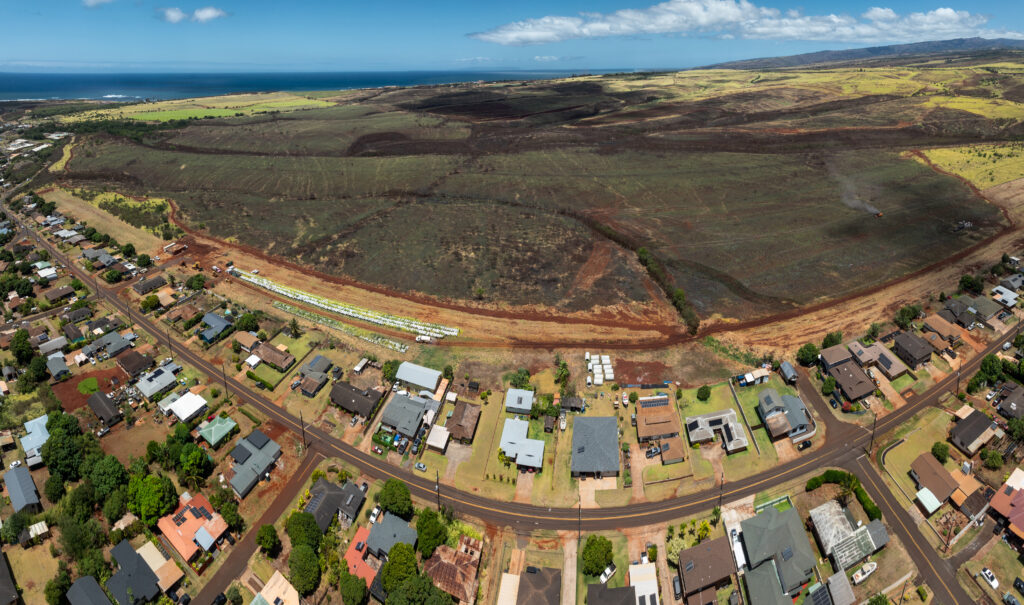 An aerial view of the burn scar left by a wildfire that burned more than 1000 acres in min-July which got dangerously close to the town of Hanapepe along Moi Road.
