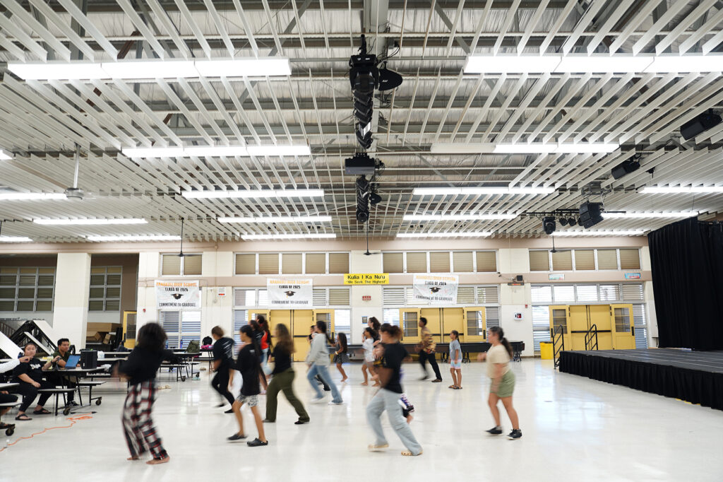 NPAC students rehearse in the Nanakuli High and Intermediate School Multi-Purpose Cafe Thursday, Aug. 212, 2024, in Waianae. (Kevin Fujii/Civil Beat/2024)