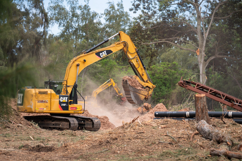 Clearing and grading work at a land parcel on Oahu's North Shore for planned development by Arete Collective and Wasatch Group. The land is adjacent coastline, conservation areas and two gold courses.