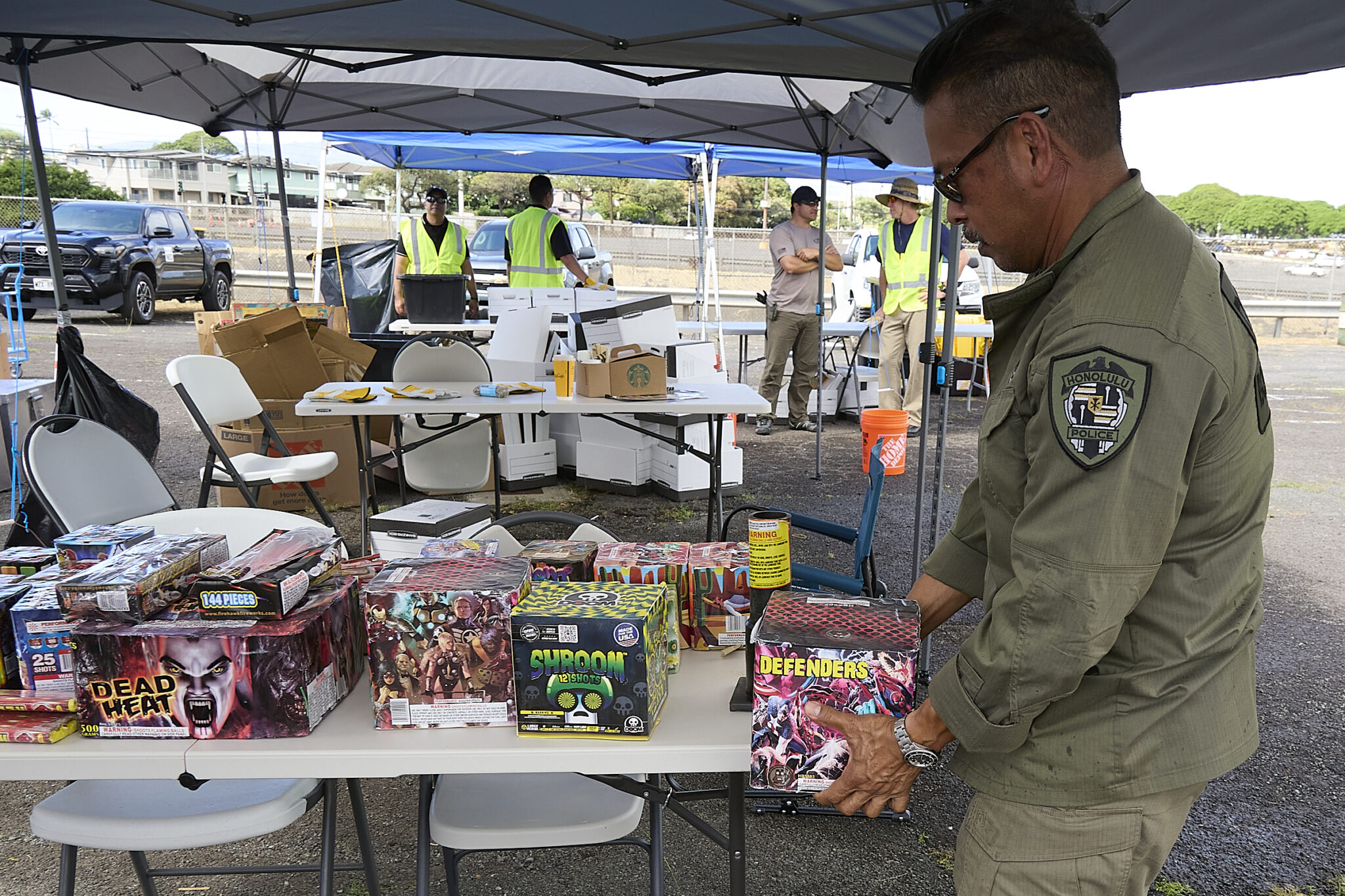 In light of the tragic loss of life at an Aliamanu Fireworks party on New Years evening, the Dept of Law Enforcement under the Direction of Jordan Lowe and in conjunction with HPD Bomb squad and various other state and local agencies conducted a Fireworks Amnesty event at Aloha Stadium on Saturday January 11th and invited the public to turn in any illegal fireworks with no questions asked.  Both professionally manufactured and self made elements were turned in to agents who sorted and packed the fireworks for disposal at a later date. (David Croxford/Civil Beat/2025)
