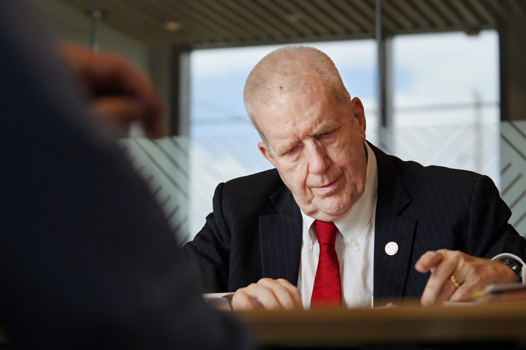 Honolulu Prosecuting Attorney Steve Alm checks his notes during a Honolulu Civil Beat editorial board meeting Friday, April 11, 2025, in Honolulu. (Kevin Fujii/Civil Beat/2025)
