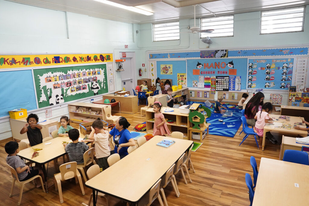 Waikīkī Community Center Preschool Manō class students and teachers work in their classroom Thursday, Sept. 11, 2025, in Honolulu. (Kevin Fujii/Civil Beat/2025)