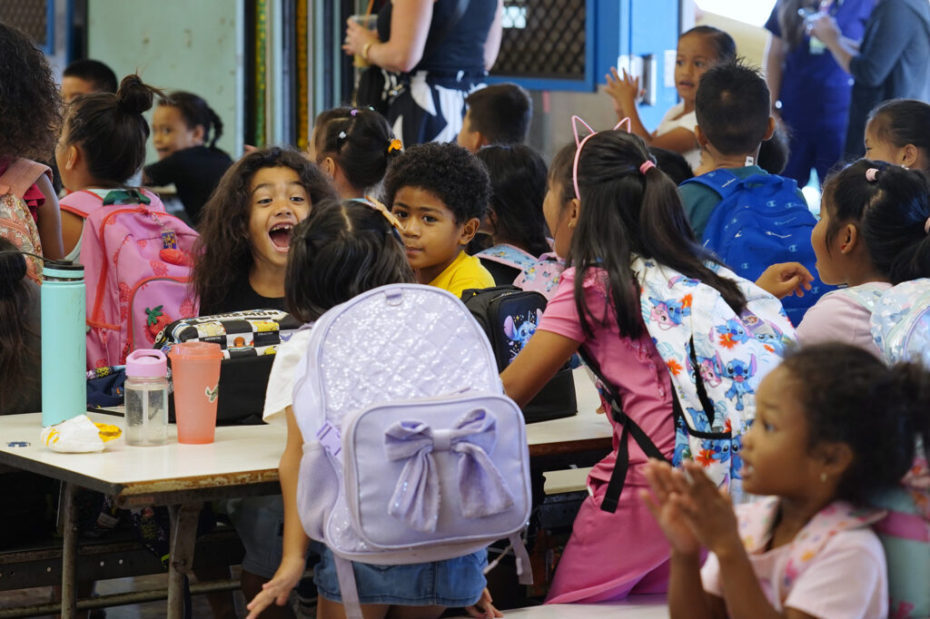 Fern Elementary School students show their excitement when a classmate wins a prize in an attendance game Friday, Sept. 26, 2025, in Honolulu. (Kevin Fujii/Civil Beat/2025)