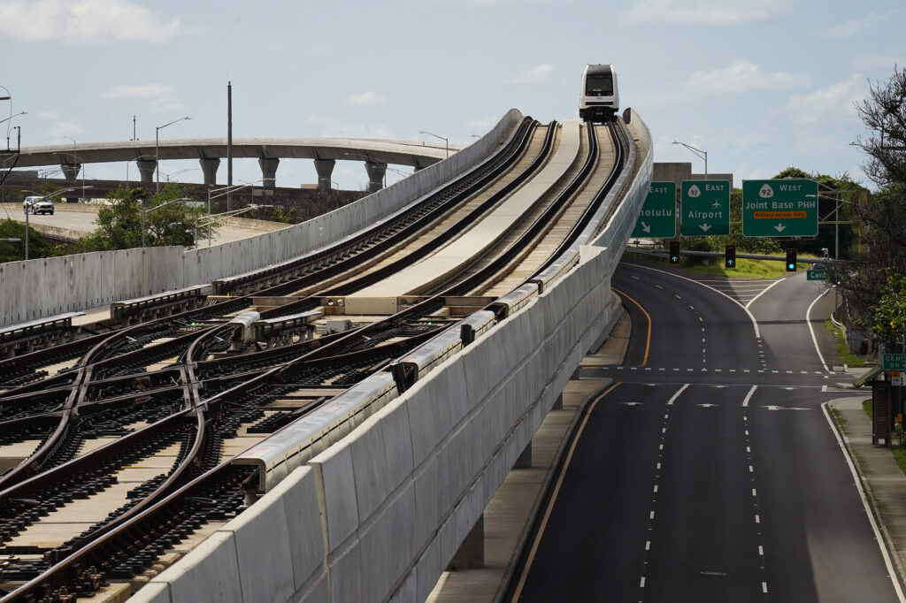 A Honolulu Authority for Rapid Transportation’s Skyline train  on the Section 2 route as seen from the Makalapa Pearl Harbor Naval Base station Thursday, Oct. 9, 2025, in Honolulu. (Kevin Fujii/Civil Beat/2025)