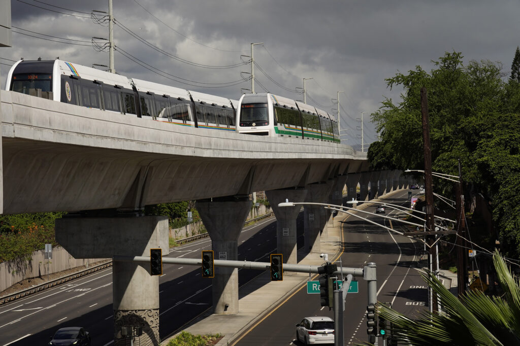 Two Honolulu Authority for Rapid Transportation’s Skyline trains on the Section 2 route as seen from the Makalapa Pearl Harbor Naval Base station Thursday, Oct. 9, 2025, in Honolulu. (Kevin Fujii/Civil Beat/2025)