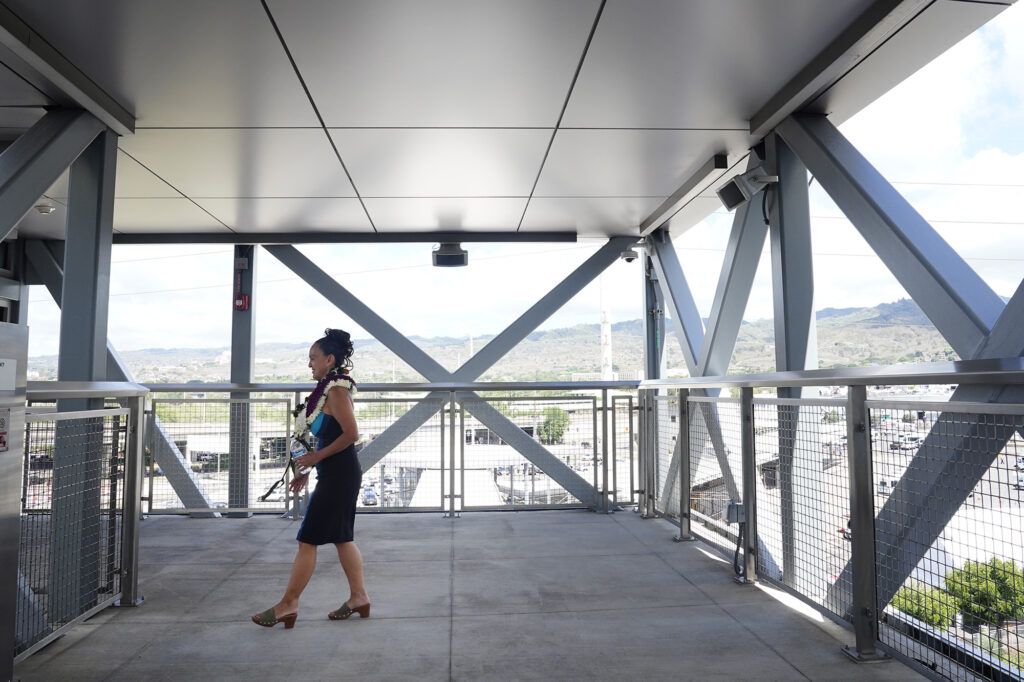 Lori Kahikina, Executive Director and CEO of the Honolulu Authority for Rapid Transportation (HART) looks from the Kahauiki Middle Street Transit Center platform Wednesday, Oct. 15, 2025, in Honolulu. The commuter train now extends past Hālawa Aloha Stadium to Kalihi’s Kahauiki Middle Street Transit Center. (Kevin Fujii/Civil Beat/2025)