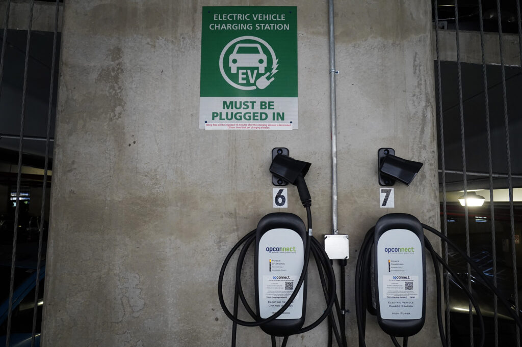Electric vehicle chargers at the Daniel K. Inouye International Airport are photographed Friday, Nov. 7, 2025, in Honolulu. (Kevin Fujii/Civil Beat/2025)