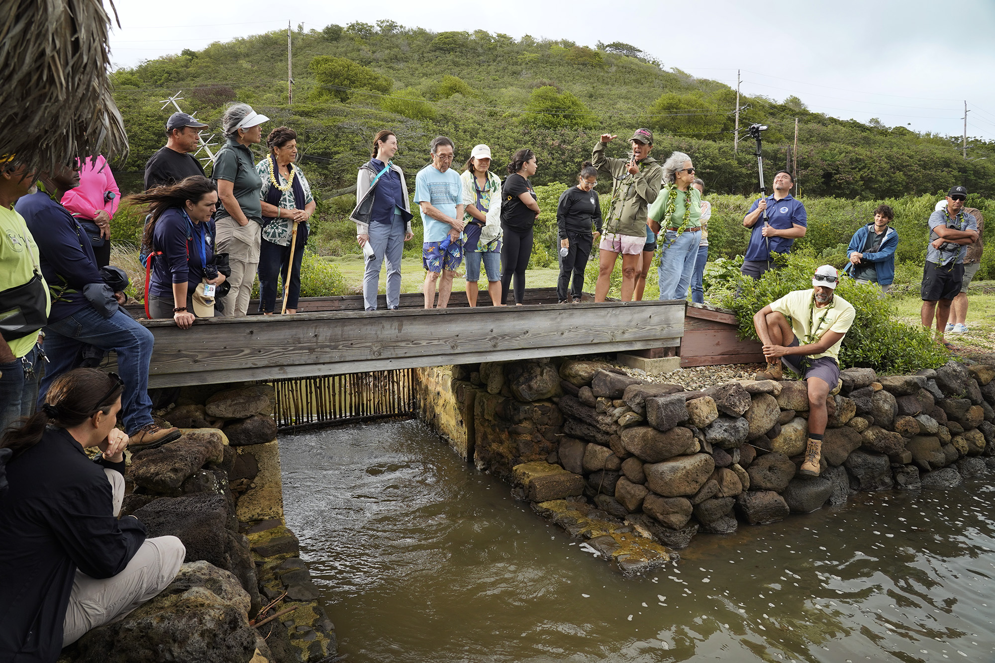 Paepae o He‘eia Executive Director Hi’ilei Kawelo describes the mākāhā, or gate, between freshwater and salt-water fishpond to Department of Land and Natural Resources’ (DLNR) Commission on Water Resource Management (CWRM) and the Honolulu Board of Water Supply Monday, Nov. 10, 2025, in Kāneʻohe. (Kevin Fujii/Civil Beat/2025)