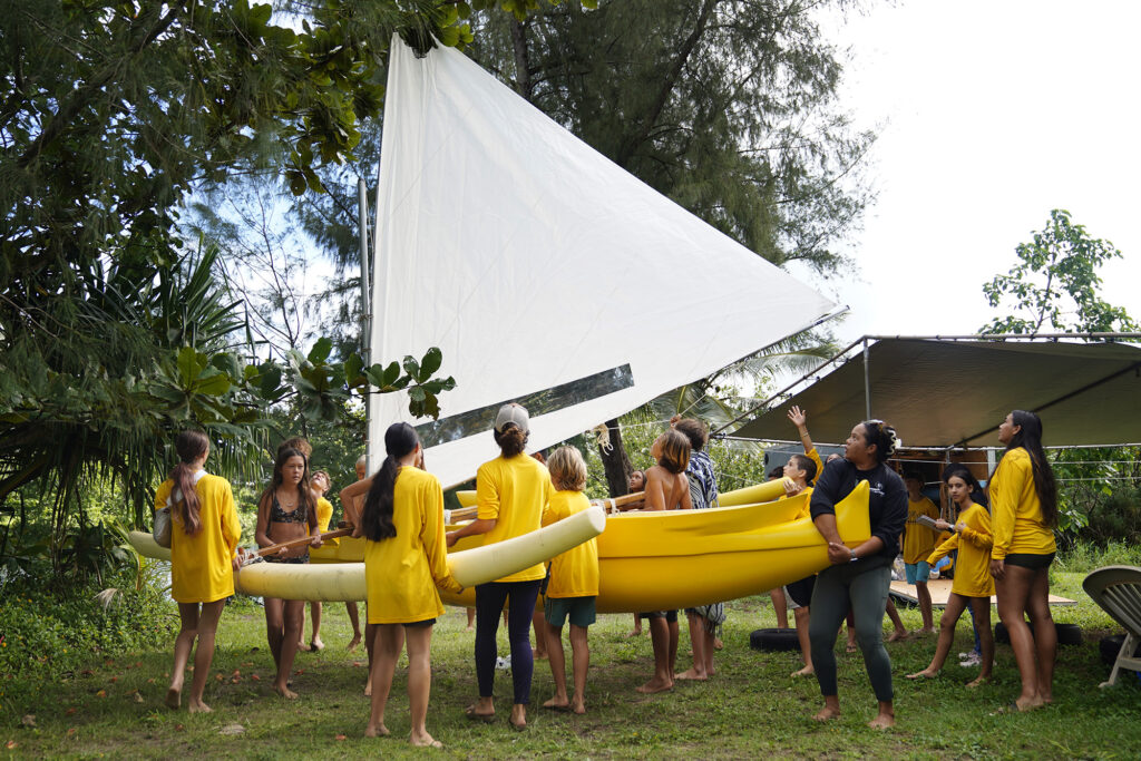 Namahana School students and volunteer take the wa‘a Titarella for an inaugural sail during an ʻāina based learning day at Hanalei Bay Wednesday, Nov. 19, 2025, in Hanalei. (Kevin Fujii/Civil Beat/2025)