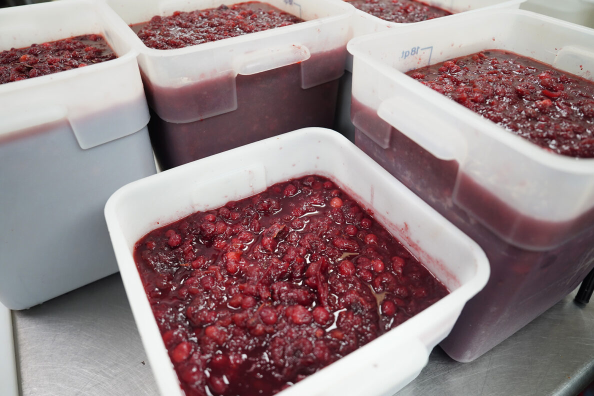 Eleven gallons of cranberry sauce will go into Hilton Hawaiian Village kitchen’s 450 Thanksgiving meals Tuesday, Nov. 25, 2025, in Honolulu. This marks the 30th year the hotel kitchen donates to the Institute for Human Services (IHS). (Kevin Fujii/Civil Beat/2025)