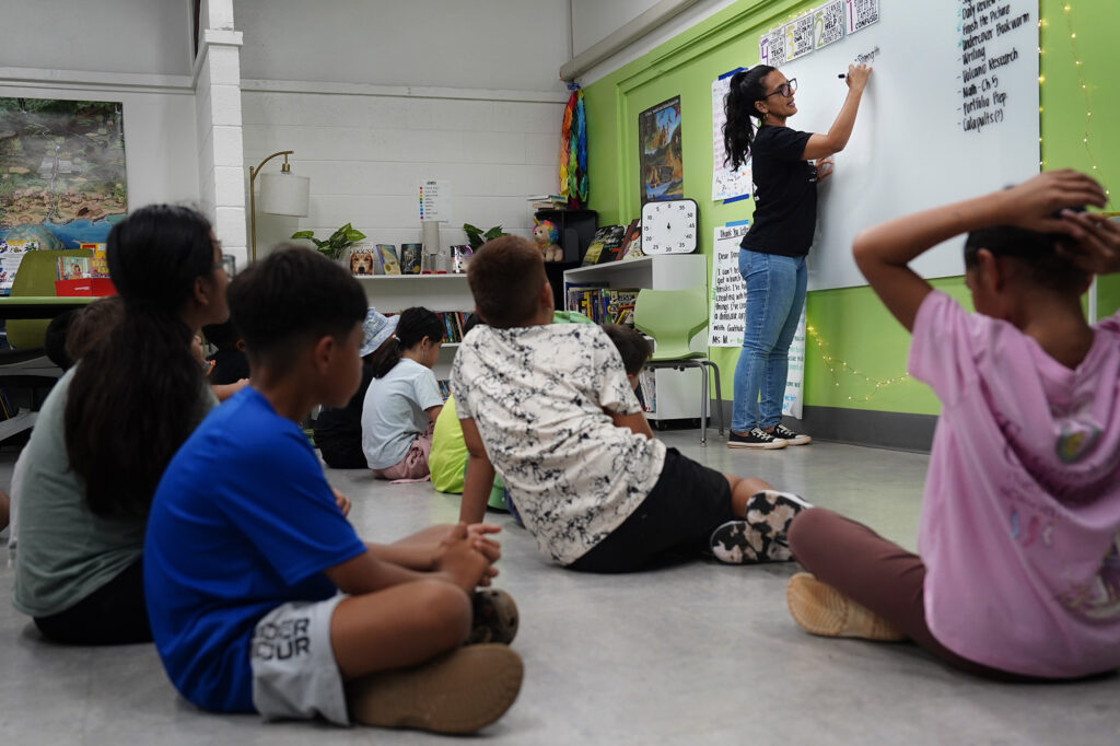 Teacher Honey Mohammadi outlines the post-lunch/recess assignment for Hawaiʻi Technology Academy 4th graders Tuesday, Dec. 2, 2025, in ʻEwa Beach. (Kevin Fujii/Civil Beat/2025)