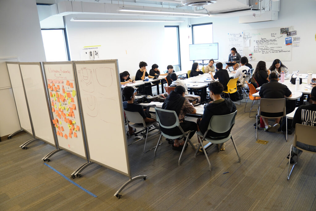 DreamHouse charter high school uses partitions as white boards and message boards to separate classes Tuesday, Dec. 9, 2025, in Kapolei. (Kevin Fujii/Civil Beat/2025)