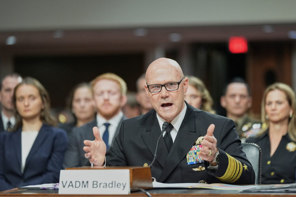Admiral Frank M. Bradley, USN, center, testifies during a Senate Armed Services Committee hearing to examine his nomination to be admiral and Commander, United States Special Operation Command, Tuesday, July 22, 2025, at the Capitol in Washington. (AP Photo/Mariam Zuhaib)