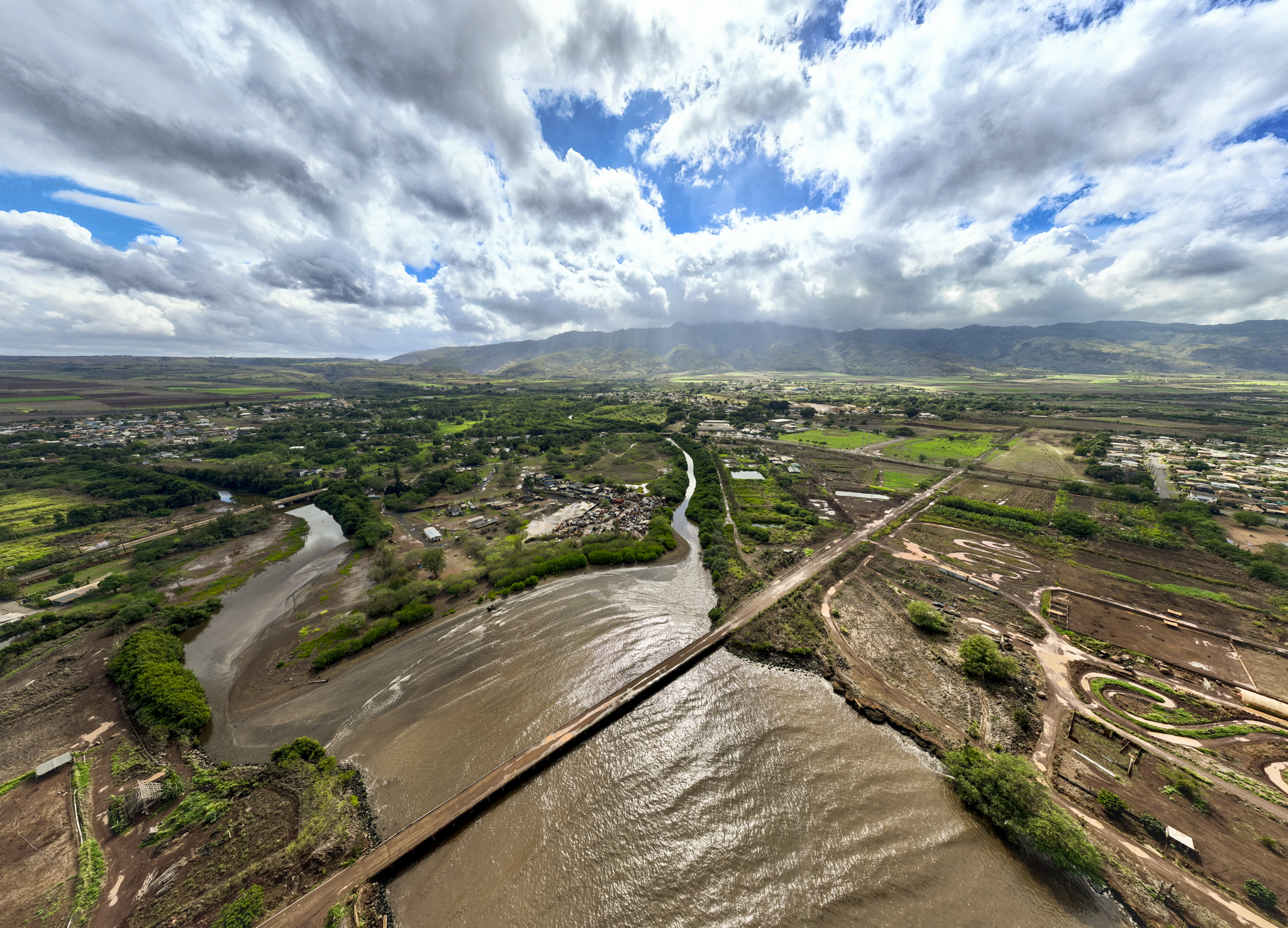 Kaiaka Bay, located on the North Shore of Oʻahu, turns brown after rains wash soil into the waters, Wednesday, Dec. 17, 2025. (Nathan Eagle/Civil Beat/2025)