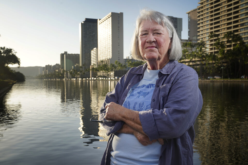 Laura Ruby is photographed on the Ala Wai Canal Friday, Jan. 9, 2026, in Honolulu. Ruby opposes the pedestrian bridge over the canal connecting Mōʻiliʻili and Waikīkī. (Kevin Fujii/Civil Beat/2026)